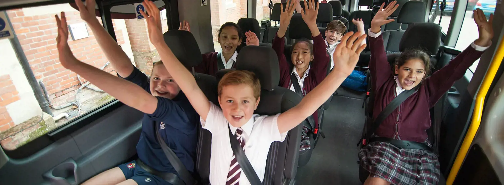 Kent College pupils on the school minibus