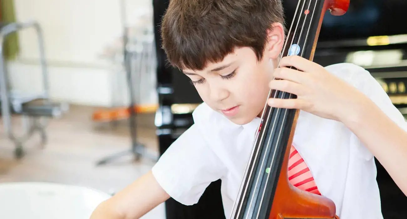 Pupil playing the double bass