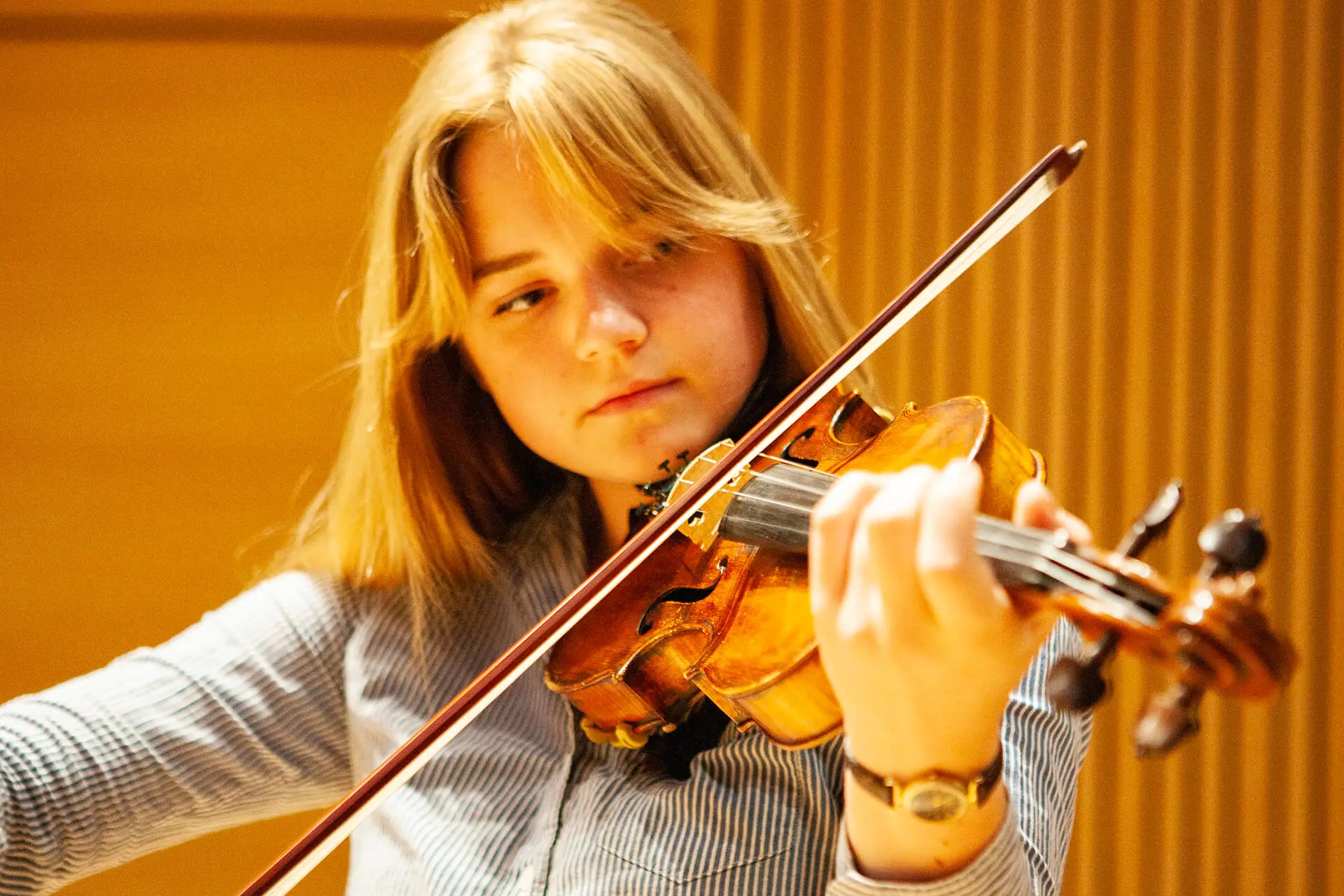 Kent College pupil playing violin