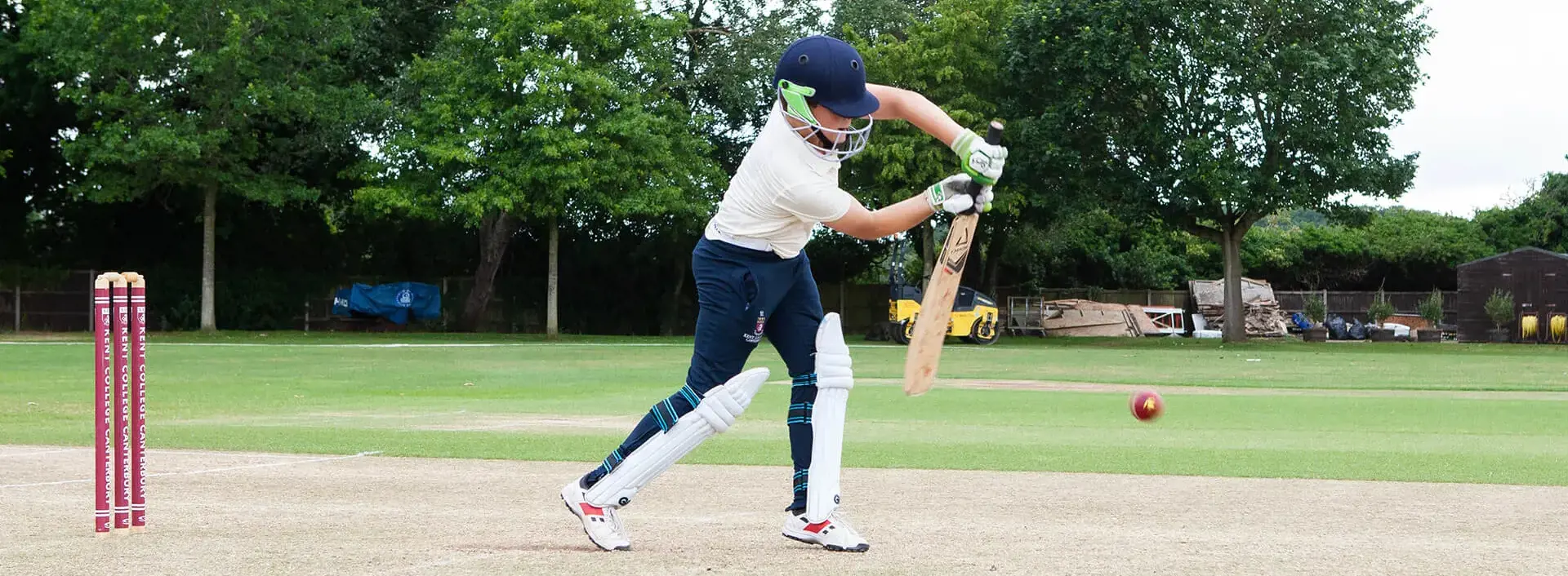 Pupil playing cricket