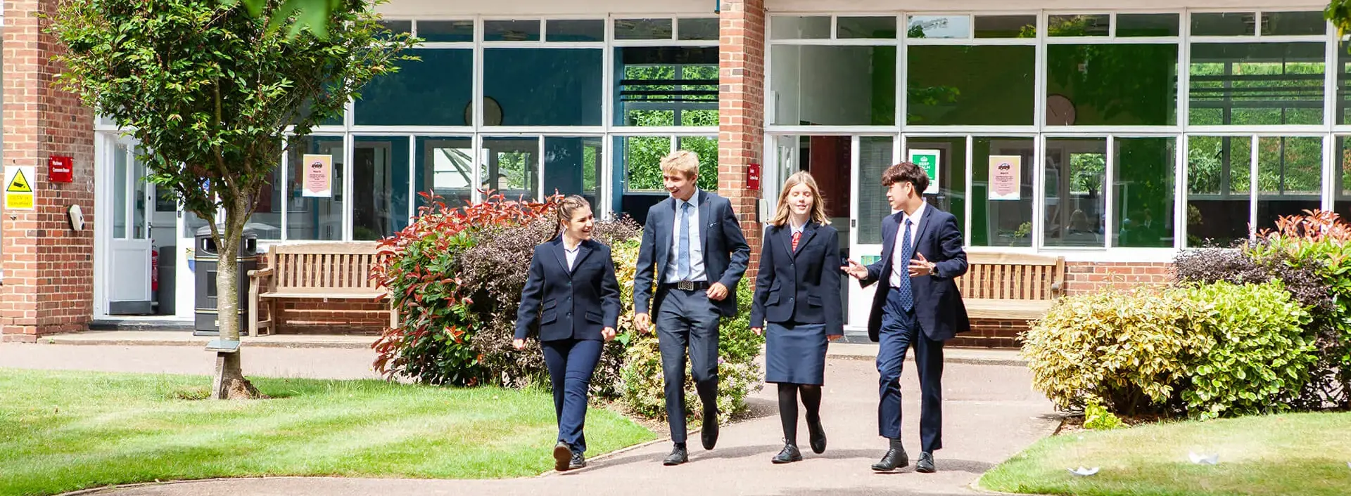 Kent College Canterbury students walking together in the Quad