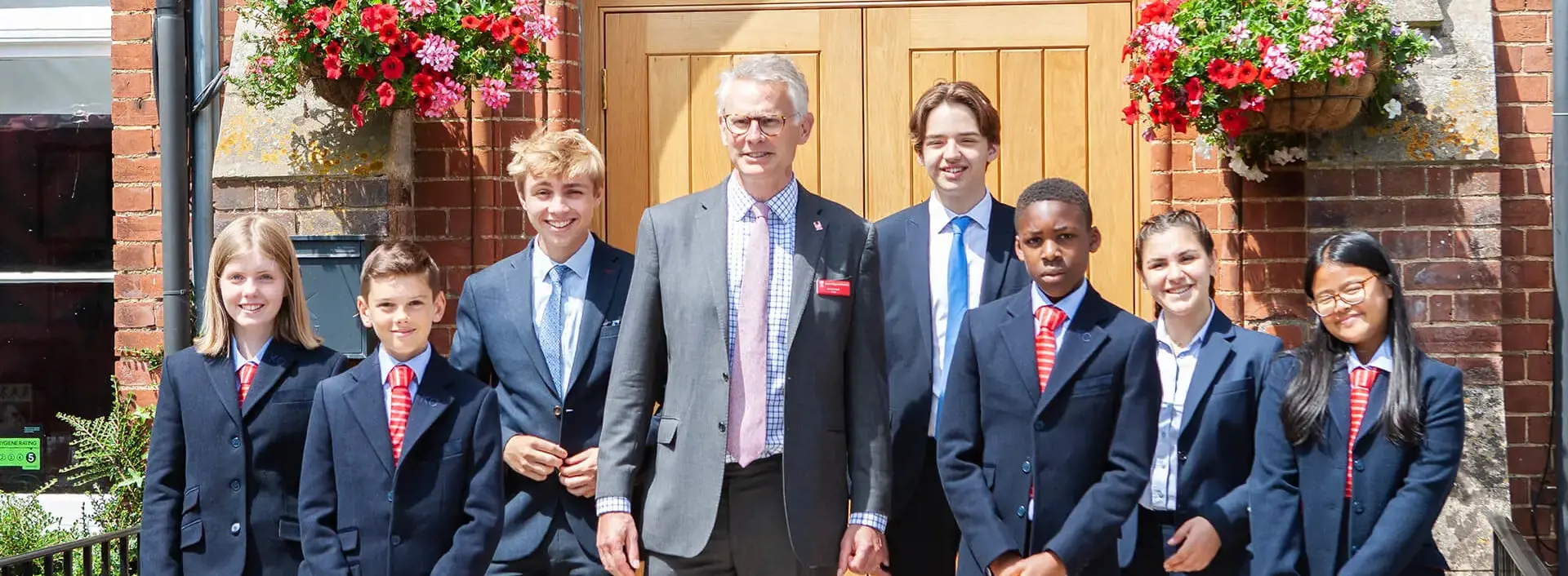 Headteacher with pupils