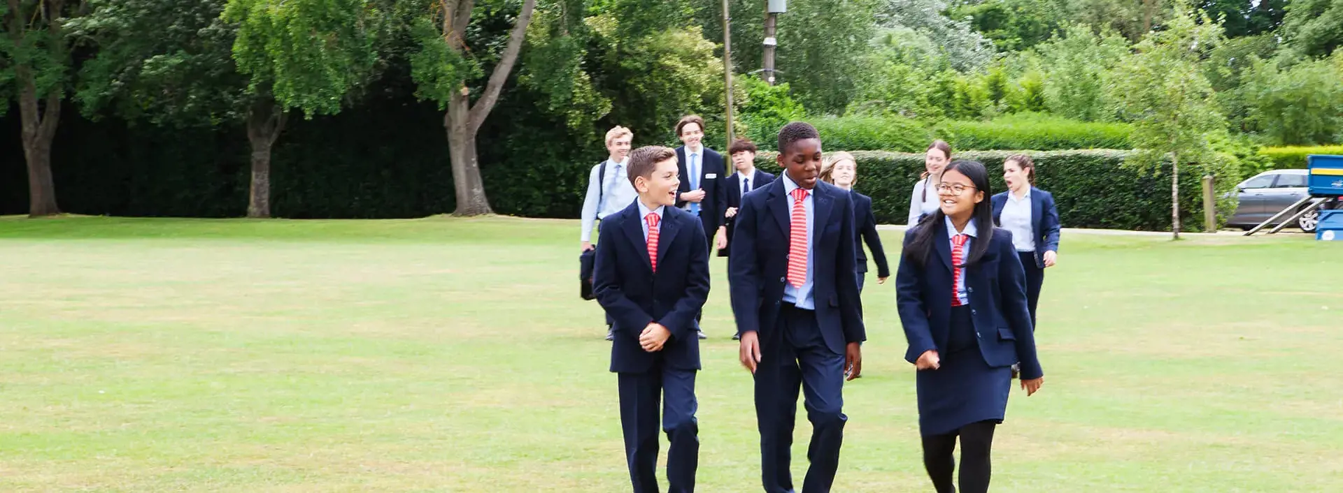 Kent College Canterbury Senior School pupils walking in the school grounds